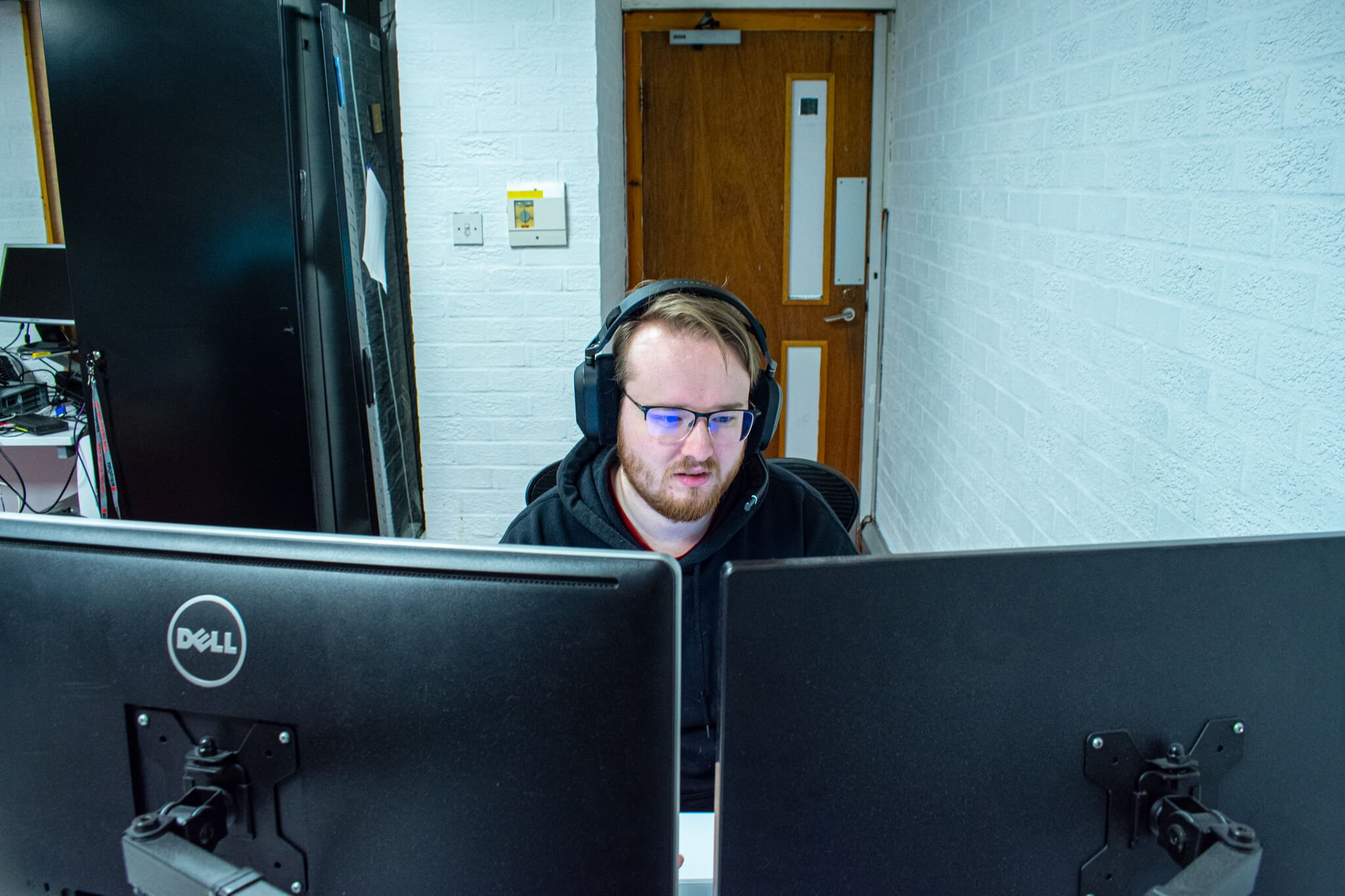 Chris reviewing computer systems